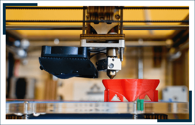 A 3 d printer is being used to make objects.